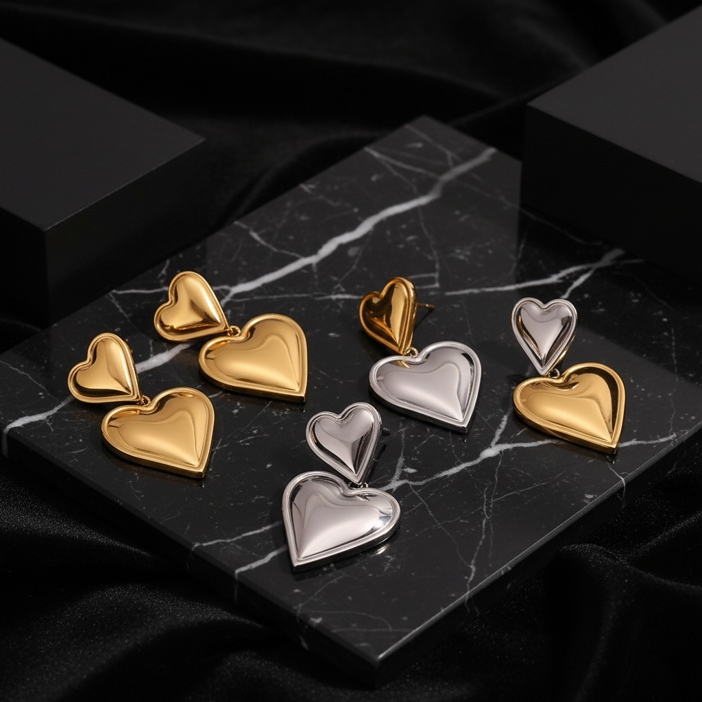 JEWELIXIRS cascading puffed heart drop earrings